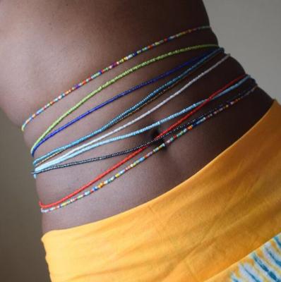 China Fashion 75 Colors African Waist Beads Puff Bohemian Style Body Jewelry Elastic Colorful Rice Bead Waist Chain for sale