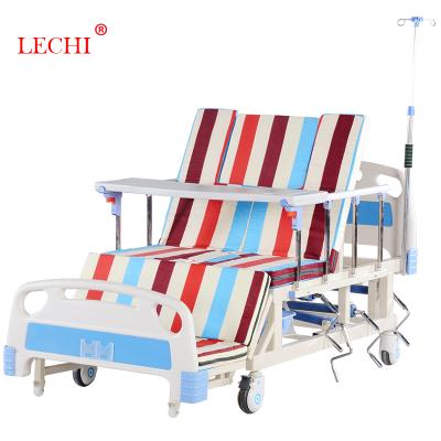 China Manual Hospital Bed Iron Bed Frame 4 Cranks Hospital Bed For Paralyzed Patients And Bedridden Patients Featuring Commode And Infusion Stand for sale