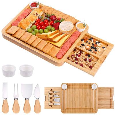 China Stocked High Quality Bamboo Cheese Board And Knife Set Ceramic Bowls Tray Charcuterie Board Serving In Organic Wood for sale