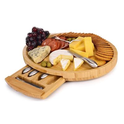 China Custom Logo Round Charcuterie Chopping Boards Cheese Board and Stocked Bamboo Knife Set with Cutlery Set for sale