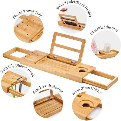 China High Quality Sustainable Bamboo Organizer Table Multifunctional Bathroom Shelving Expandable Bamboo Tub Cart Tray With Wine Glass Holde for sale