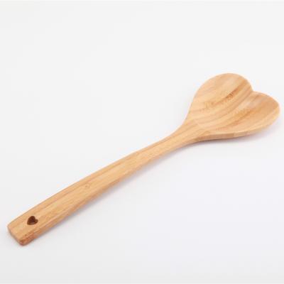 China Wooden Serving Mixing Spoon Stocked Custom Heart Shaped Bamboo Wood Kitchen Utensils Spoon For Cooking Baking Stirring for sale