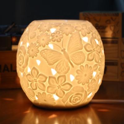 China Electric Candle Warmer Oil Burner Fragrance White Ceramic Lamp Oil Aroma Censer For Home Decoration for sale