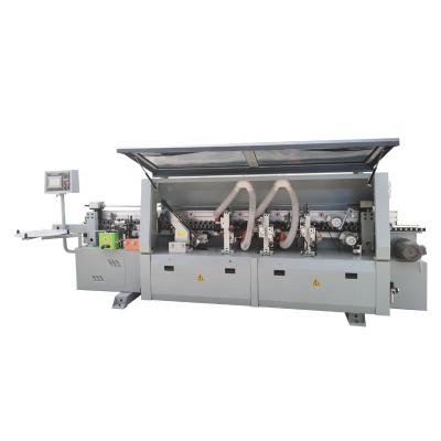 China Woodworking panel furniture production six function automatic wardrobe edge and edge machine cabinet banding machines for sale