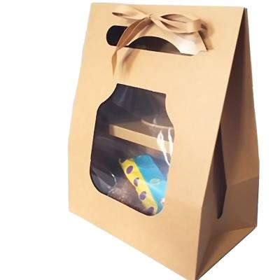 China Biodegradable Clamshell Tote Window Kraft Paper Gift Bag Birthday Candy Hand Twist Packing Box Bow Gift Bag for sale