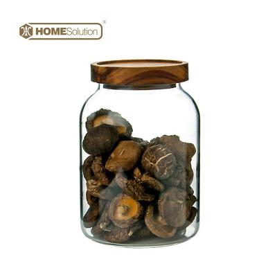 China Custom Freshness Preservation Wholesale Logo Borosilicate Glass Jar Custom Food Container With Screw Cap Acacia Wood Lid for sale