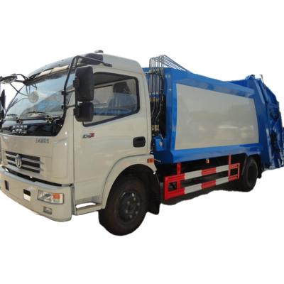 China Hotels Municipal Solid Waste Container Japan 5m3 Compressed Garbage Truck For Sale for sale