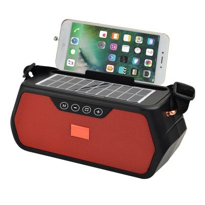 China Hot Selling OEM Portable BT 5.0 Portable Solar Speaker Waterproof Power Bank With Cell Phone Holder for sale