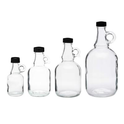 China Golden Beverage Supplier Supply Good Selling Fancy California Amber Glass Transparent Glass Bottle Tabletop Bottles For Maple Syrup for sale