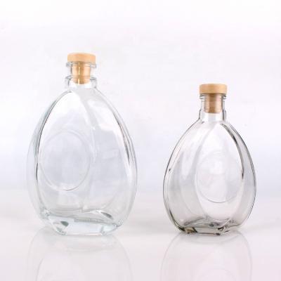 China High Quality 250ml 500ml Beverage Liquor Vodka Clear Flat Glass Wine Bottles With Cap Wholesale Whiskey Bottle for sale