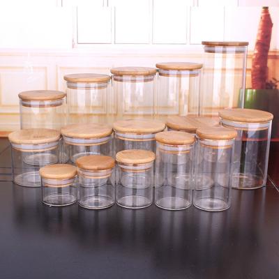 China Stocked Food Sealed Round Clear Borosilicate Glass Jar With High Quality Bamboo Lid for sale