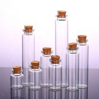 China 10ml 20ml 30ml 50ml Personal Care Empty Glass Transparent Clear Bottles With Cork Stopper for sale