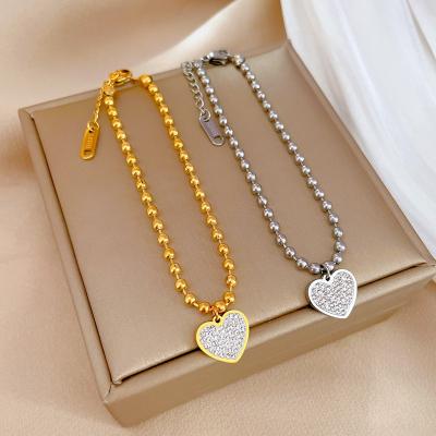 China TRENDY 18K gold plated zircon heart charms 316L stainless steel beads bracelet for women for sale