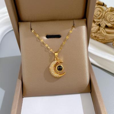 China TRENDY Korean fashion cute moon one hundred languages I love you projection pendant gold plated necklace for women for sale