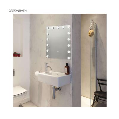 China ORTONBATH Hotel Modern Style Large Illuminated Wall Mounted Mirror Illuminated Bathroom Mirror With Led Light for sale