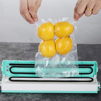 China Household Kitchen Food Vacuum Sealer Mini Table Food Small Vacuum Portable Home Sealer for sale