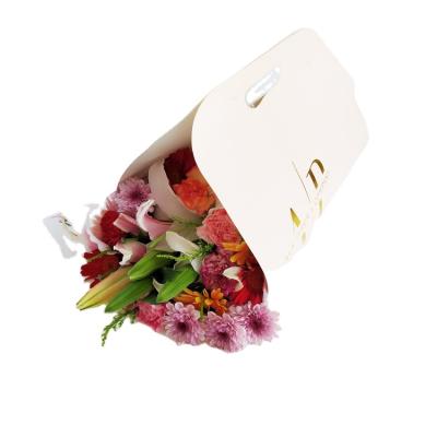 China Recyclable Custom Made Logo Hand-tied Flower Bouquet Carrier, Blush Flower Carrier Bag L006 for sale