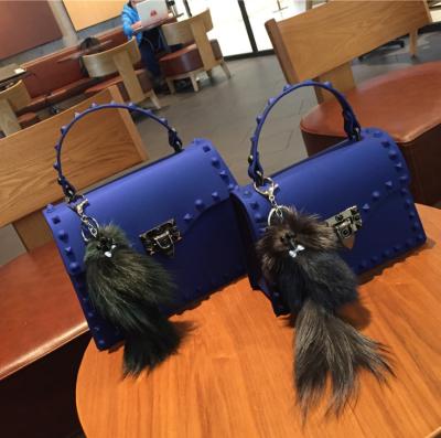 China Luxury Famous Brands Women Designer Handbag Candy Bag Rivet PVC Jelly Bag Tote Bag Fashion Ladies Luxury Handbags Pinch With Fur Decoration for sale