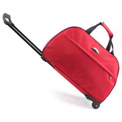 China Cheap red waterproof 600D duffle travel trolley luggage organizer wheel bag female empty flight bag water resistant with wheels carry on for sale