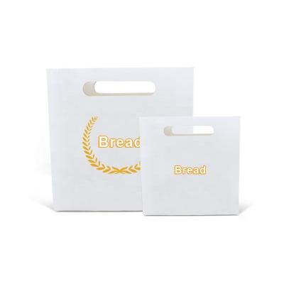 China Recyclable Manufacturers Customize Cute Flower Lunch Packaging Paper Mailing Shopping Tote Black White Bag With Ribbon for sale