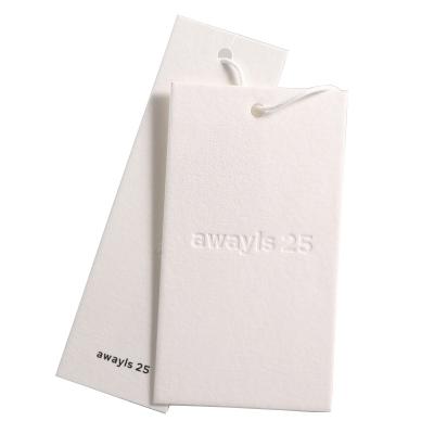 China Sustainable Luxury Custom Embossed Hang Tags Cardboard Garment 800gsm Tags Clothing Labels for sale