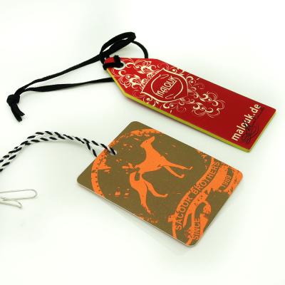 China Colorful Craft Paper Hang Tags With String For Clothing , Fashion Business Hang Tags for sale