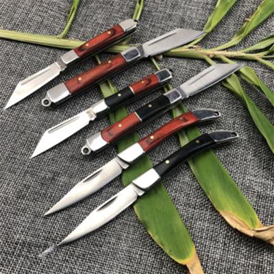 China 2021 factory red portable durable small eco-friendly custom solid wooden handle pocket folding knives and black for sale