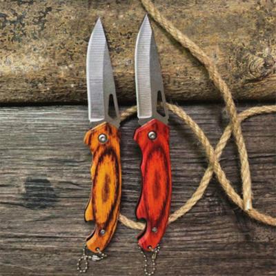 China 2021 Factory Kitchen Self Defense Two Colors Quick Release Eco-friendly Folding Original Outdoor Knife Wooden Handle for sale