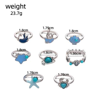 China Decoration Vintage Small Exquisite Niche Designer's New Silver-Plated Open Ring Turquoise Pine Light Luxury Fashion Rings for sale