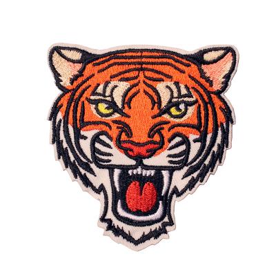 China Sustainable Wholesale Sew on Custom Colorful Brand Logo Merrow Border Machine Woven Small Patches for Hats Bags Pantone Shoes OEM for sale