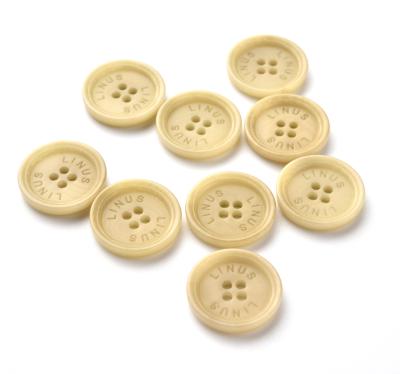 China Widely Used Dry Cleaning Top Quality 4 Holes Nut Button Corozo Sewing For Apparels for sale