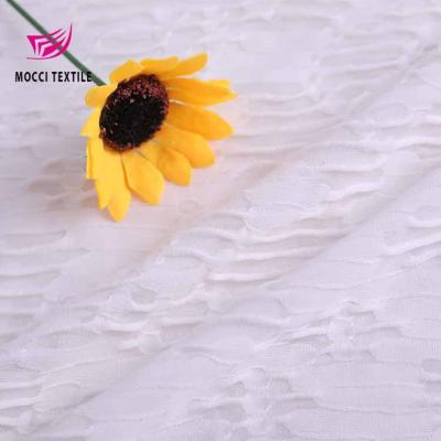 China Antistatic White Polyester 160gsm Spandex Jacquard Knitted Fabric For Dress for sale