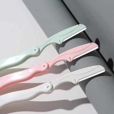 China Foldable Designed Plastic Eyebrow Razor Handle Eyebrow Shaver for sale