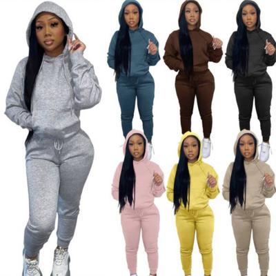 China Anti-pilling New Trendy Drawstring Pockets Bodycon Clothing Set Women Tracksuit Women Hoodie Two Piece Set for sale