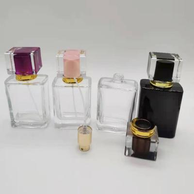 China New Design NJ Cosmetic Multi Colors Wholesale Square 50ml Refill Spray Glass Empty Perfume Bottle for sale