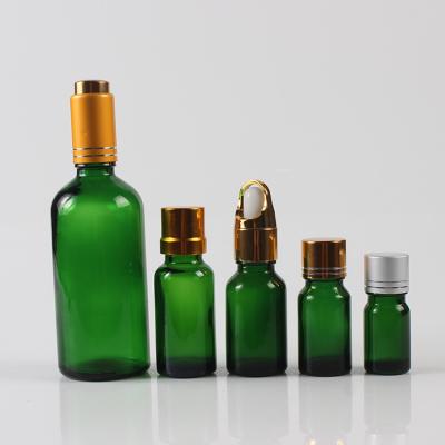 China Personal Care NJ Vintage Style 5ml Round Cylinder Spray Empty Dark Green Glass Essential Oil Bottle for sale