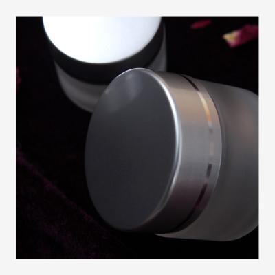 China Hot Skin Care Cream Shot Shaped Cream Cosmetic White Frosted Glass Jar With Matte Lid Silver Color for sale