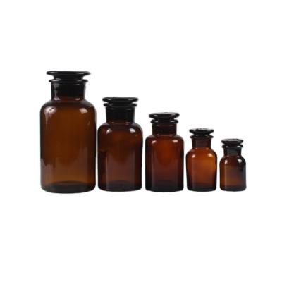 China Wholesale Custom Size Chemical Amber Color Medical Glass Reagent Bottle With Sealed Glass Stopper for sale