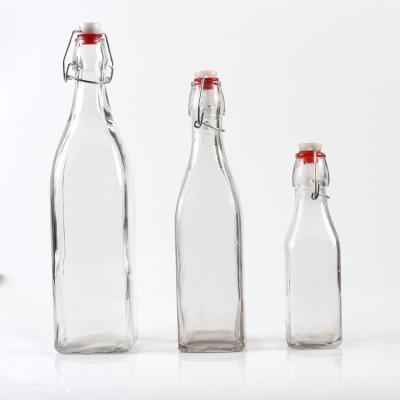 China Hot Selling Liquid 120ml 500ml 900ml Liquor Square Glass Beer Bottle With Crown Top Cap for sale