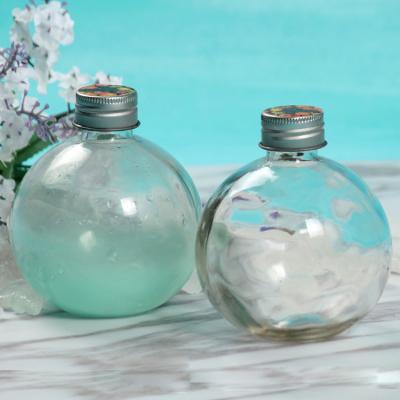 China Beverage NJ Round Ball Shape Glass Transparent Liquid Beverage Liquor Bottle 500ml With Screw Cap for sale