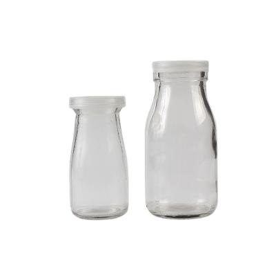 China 200ml milk factory price tell off clear glass pudding lipstick jar with plastic lid for milk yogurt for sale