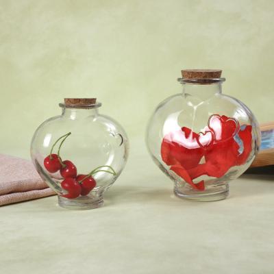 China Newest Freshness Preservation NJ Design Gift Heart Shape 300ml Empty Clear Food Storage Glass Jars With Lids for sale