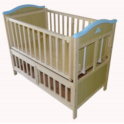 China Solid Wood Toddler Bed Hutch Baby Cradle Swing Automatic Wooden Bed for sale