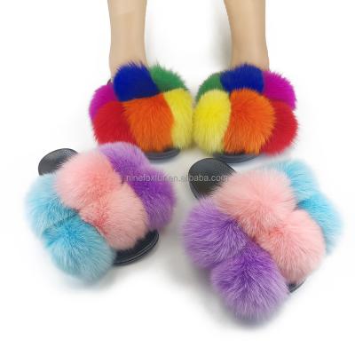 China Fashion Trend Real Fur Luxury Soft Ball Pom Slippers For Home Wear for sale