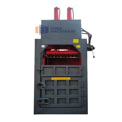 China Straw ; Cardboard; waste paper; etc best price vertical baler for waste carton vertical baling machine for sale