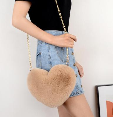 China 100% Eco-Friendly Winter Plush Heart Shoulder Handbags Faux Fur Purses And Handbags for sale