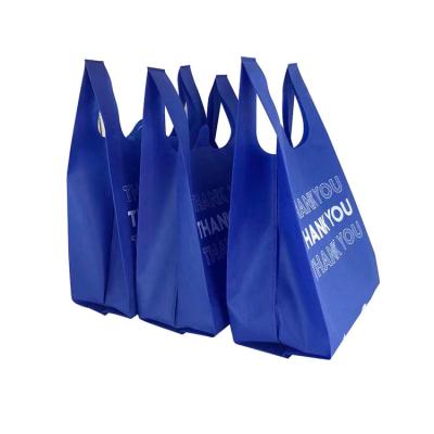 China Hot Selling Eco-friendly D Reusable W Die Cut Nonwoven Bag Supermarket Promotional Packaging Bag With Logo for sale