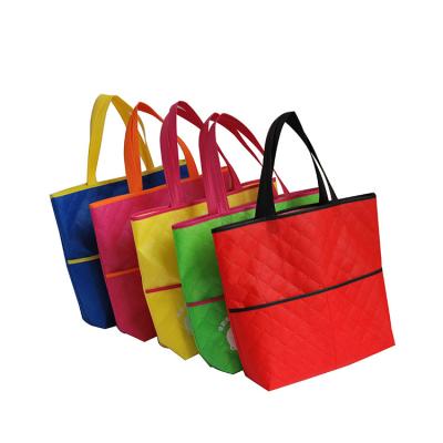 China Eco - Friendly High Quality Red Laminated Metal Clad Nonwoven Shopping Garment Bag for sale