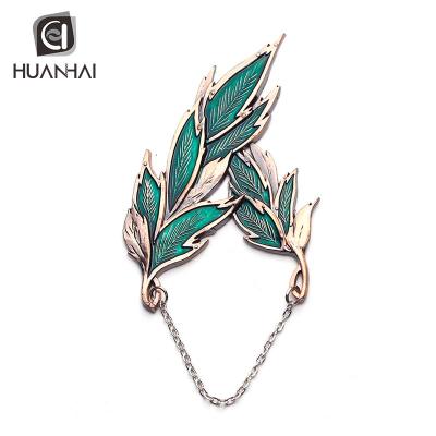 China Europe OEM Metal Enamel 3D Feather Shape Feather Pin Bronze Plated Badge With Chain for sale