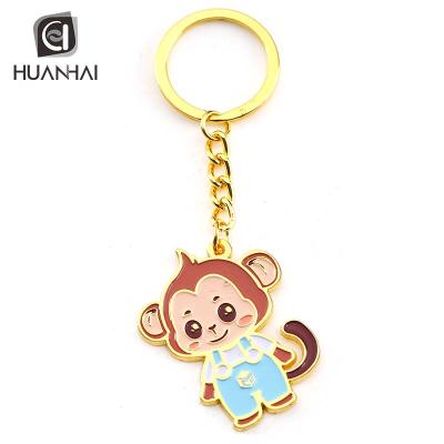 China Custom Cute Soft Anime Gold Metal Monkey Metal Enamel Key Chain for sale